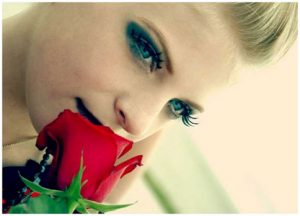 Women Sniffing Rose