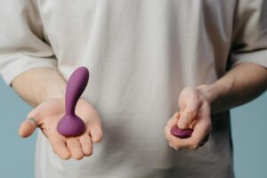 Butt Plugs Being Held